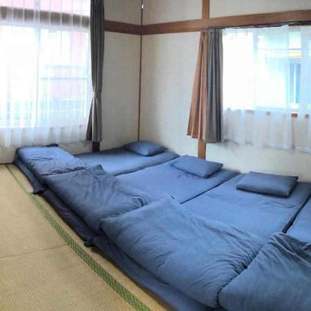 Golden Mile Apartment Amami Extérieur photo