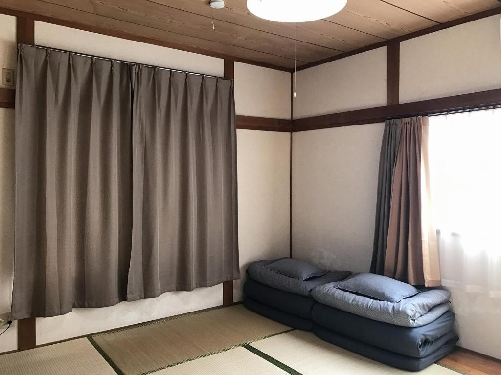 Golden Mile Apartment Amami Extérieur photo